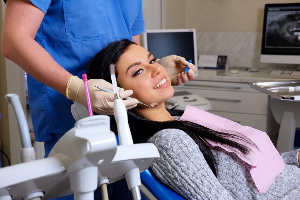 A woman receiving dental implants